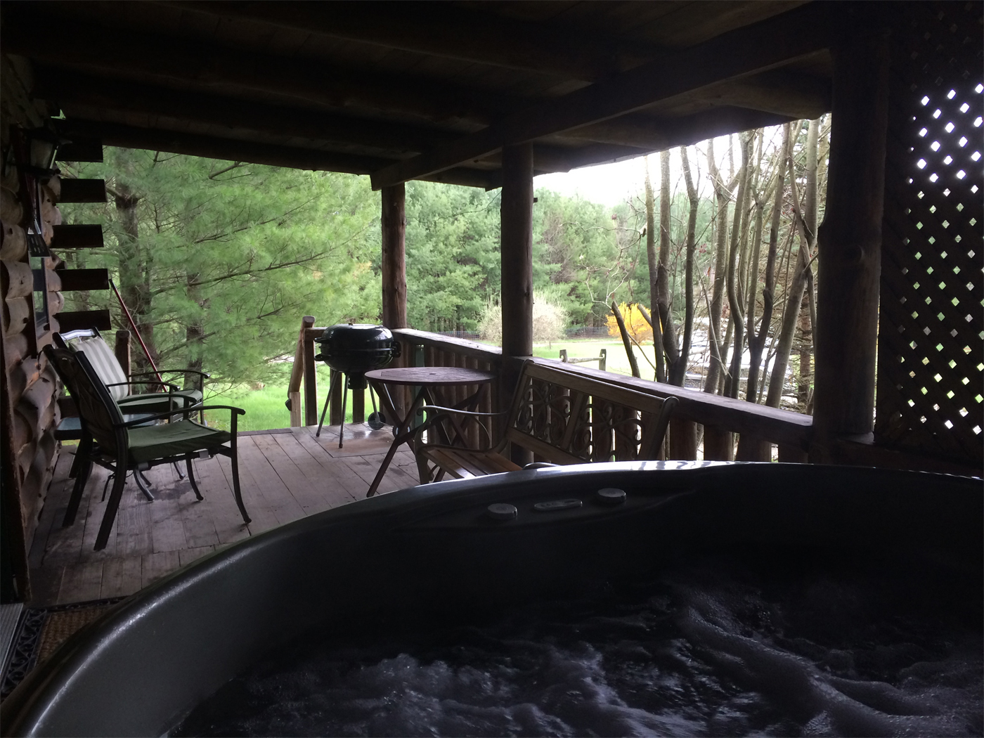 jacuzzi, deck, table, chairs